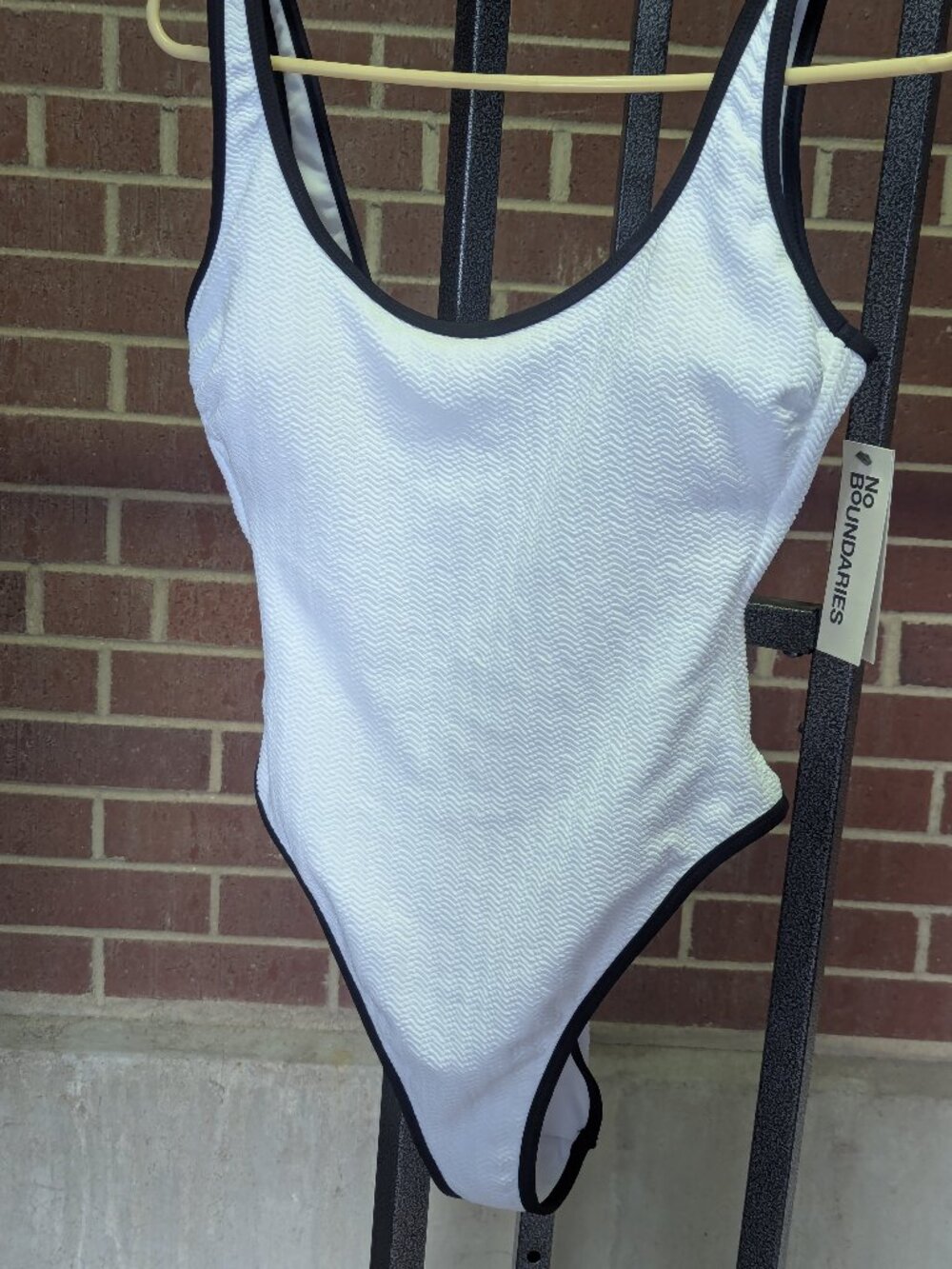 No Boundaries White One-Piece Swimsuit with Black Trim Accents